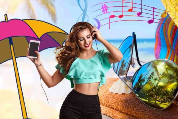 Donna che ascolta musica tormentoni estate 2023
